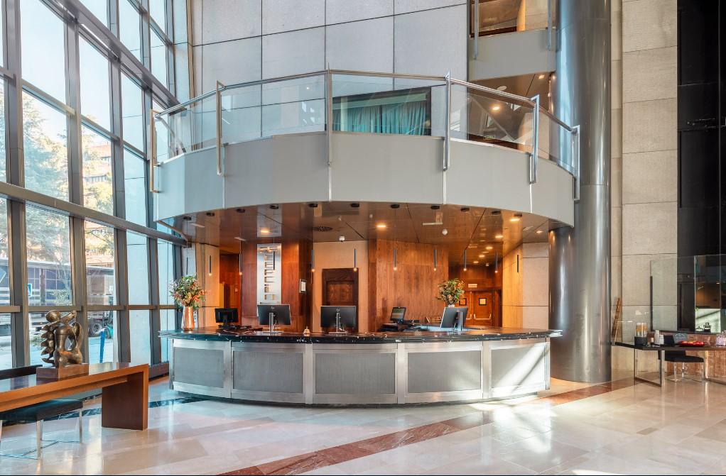 Eurostars Suites Mirasierra Madrid Exterior foto The lobby of the hotel
