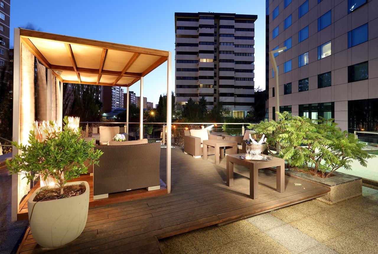 Eurostars Suites Mirasierra Madrid Exterior foto The rooftop garden at the hotel